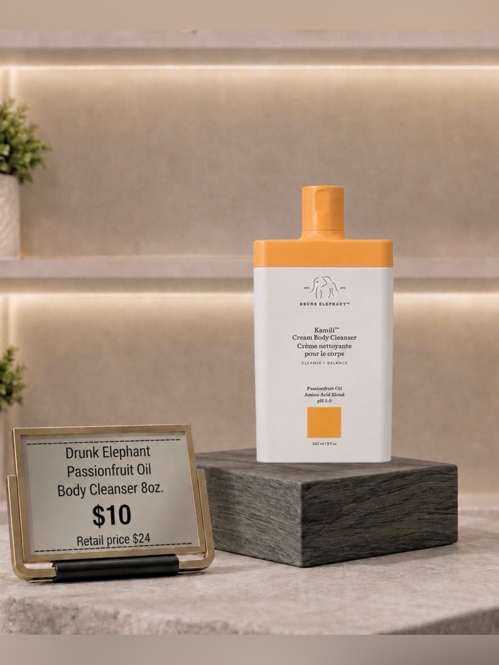 Drunk Elephant Kamili Cream Body Cleanser - Orange and White Bottle